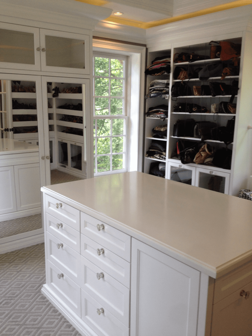 A Fully Arranged Shoes Cupboard in White