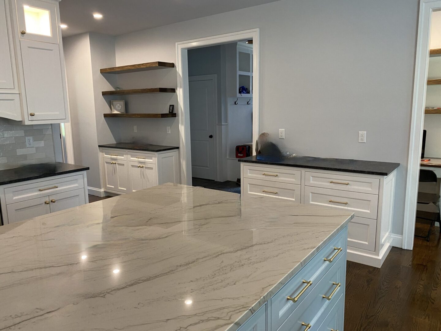 A Kitchen Space of a House With Marble Counters