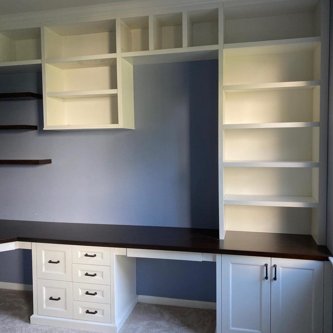 White Color Shelving Space Above a Desk