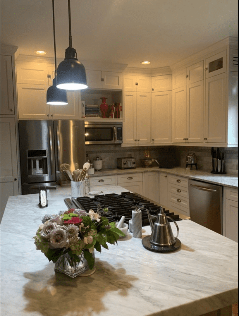 A Kitchen Island Space With an Overhead Light