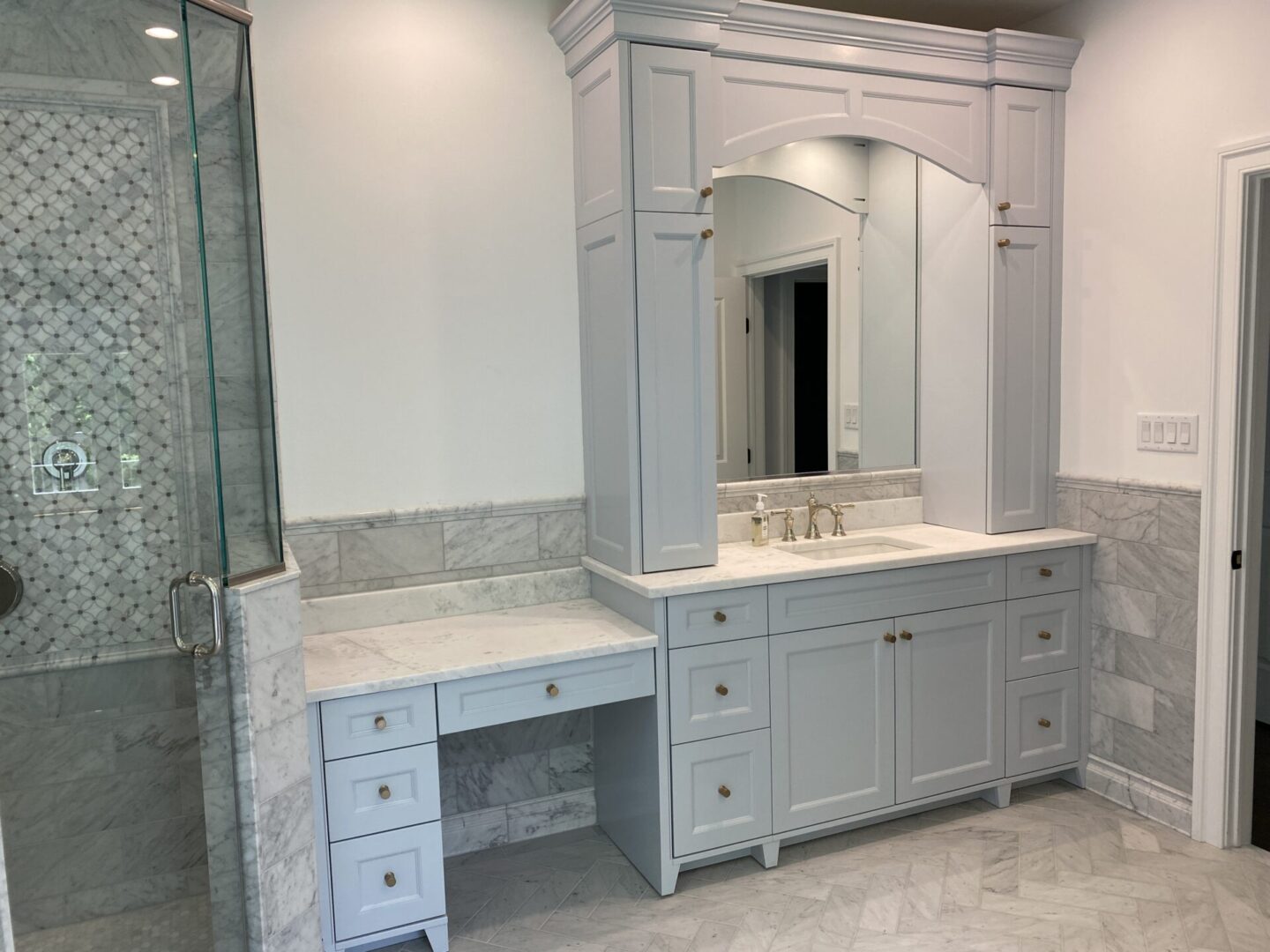 A White Color Dresser Around a Sink Space